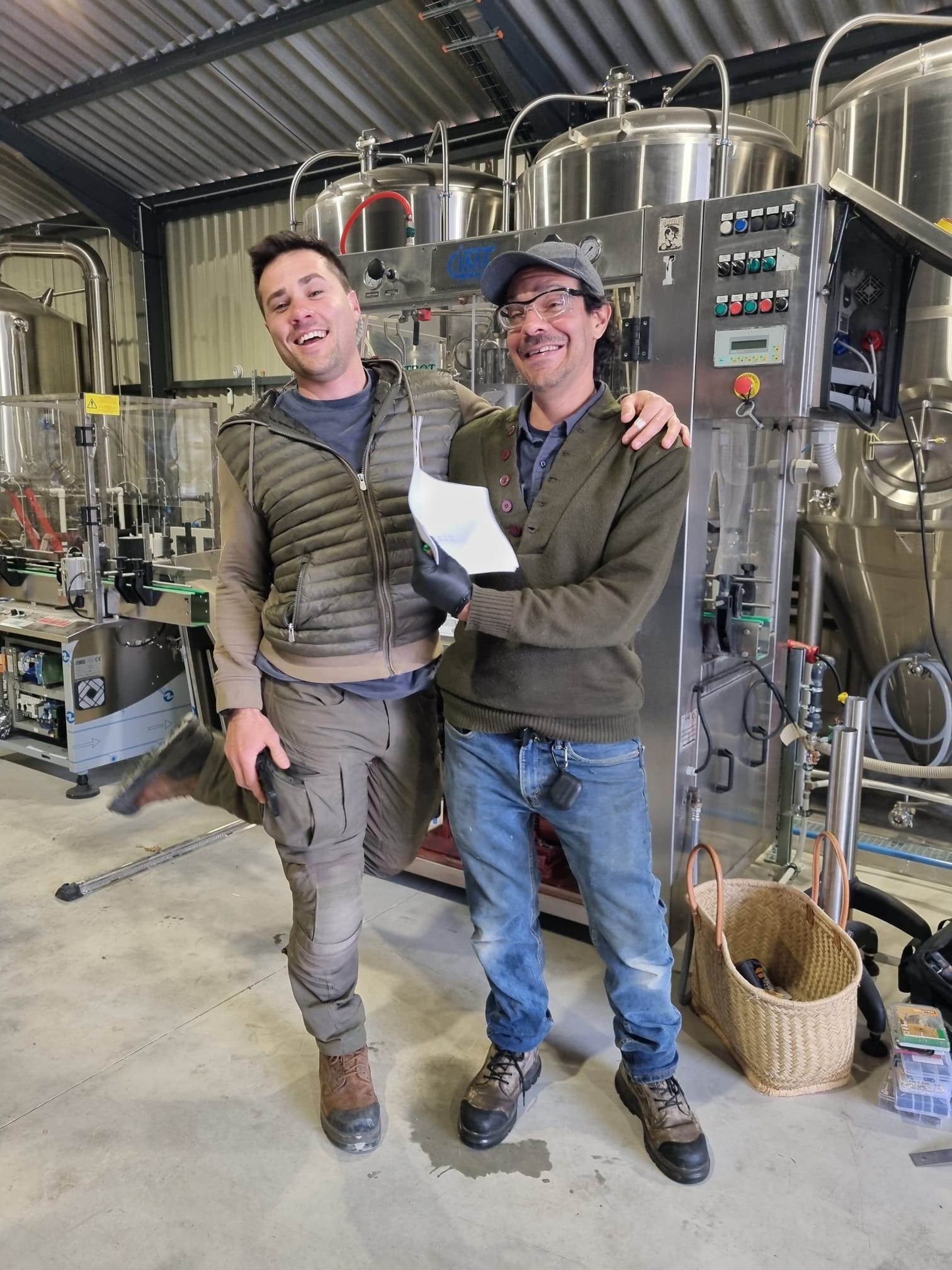 Holding the finished Sainte-Croix Biere Blanche bottle